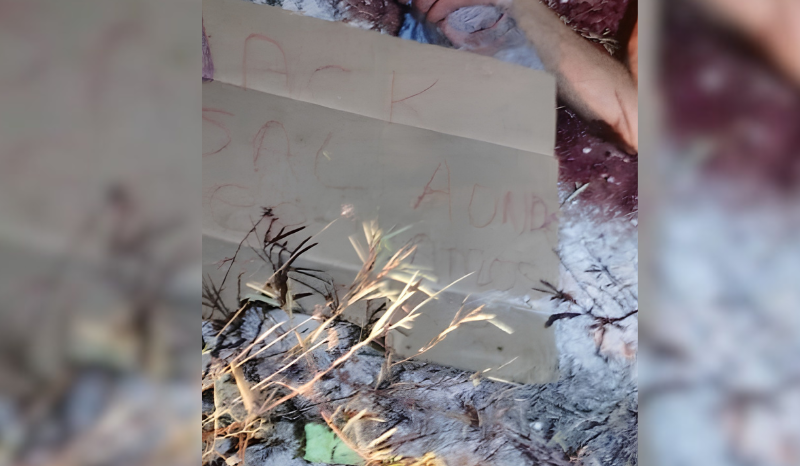 Homem é encontrado morto com marcas de agressão e placa em Manaus